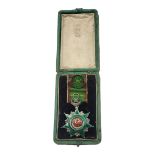 A GOLD AND SILVER OTTOMAN EMPIRE ORDER OF OSMANIEH NECK BADGE, 1862 Silver seven pointed star with a
