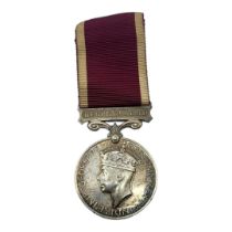 A SILVER LONG SERVICE AND GOOD CONDUCT GEORGE VI MEDAL Issued to 1423523 SJT. L. Armstrong R.A.