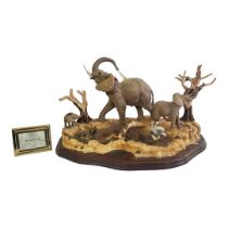 A WORCESTER ORNAMENTAL STUDIO ELEPHANT GROUP FIGURINE Titled 'The Water Hole', limited edition