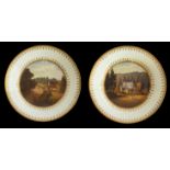 A PAIR OF SWANSEA CABINET PLATES Polychrome painted with a view of Underdown near Ledbury and