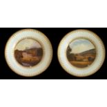 A PAIR OF SWANSEA CABINET PLATES Polychrome decorated within gilded formal border, depicting Upper