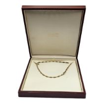 A MID 20TH CENTURY HAM AND HUDDY 9CT GOLD NECKLACE Set with trace link chain, fully marked ‘375’, in