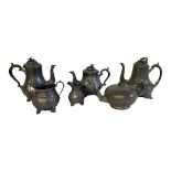 A COLLECTION OF 19TH CENTURY PEWTERWARE Comprising a four piece teaser,large coffee pot and