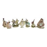 A COLLECTION OF SEVEN VINTAGE CONTINENTAL 'LACE' PORCELAIN FIGURINES To include a seated figure with