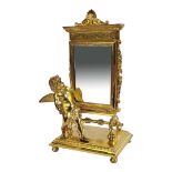 A GEORGIAN STYLE GILDED CHEVAL MIRROR With winged cherub artist alongside, on a stepped base. (w