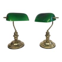 A PAIR OF EDWARDIAN STYLE POLISHED BRASS TOP DESK LAMPS With adjustable green glass shades, made