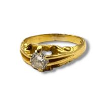 AN 18CT GOLD AND DIAMOND GENT’S SIGNET RING The single round cut diamond in a scrolled mount. (
