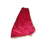 A PAIR OF LARGE CERISE VELVET DRAPES With gold rope tassels, lined, with ties. (410cm x 175cm)