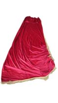 A PAIR OF LARGE CERISE VELVET DRAPES With gold rope tassels, lined, with ties. (410cm x 175cm)