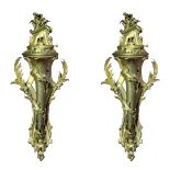 A PAIR OF LARGE CONTINENTAL GILT BRONZE WALL SCONCES With pierced foliage backs supporting single