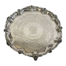 A VICTORIAN SILVER CIRCULAR SALVER With scrolled border and engraved decoration, presentation