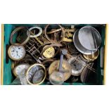 A COLLECTION OF 19TH CENTURY AND LATER BRASS CLOCK MOVEMENTS Along with enamelled dials and pendulum