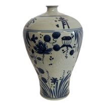 A CHINESE STYLE GLAZED CERAMIC MEIPING VASE In a Maebyeong shape with blue and white painted