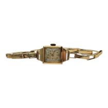 DAMAS, AN EARLY 20TH CENTURY 9CT GOLD LADIES’ WRISTWATCH Rectangular silver tone dial, on an