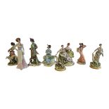 CAPODIMONTE, A COLLECTION EIGHT ITALIAN PORCELAIN FIGURES To include four figures with dogs, a