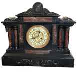 A 19TH BELGIAN BLACK AND ROUGE MARBLE CLOCK Architectural form, with white enamelled and gilt ormolu