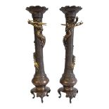 WITHDRAWN!! A PAIR OF 19TH CENTURY JAPANESE MEIJI BRONZE DRAGON CANDLESTICKS