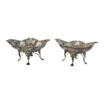 A LARGE PAIR OF VICTORIAN SILVER SWEETMEAT DISHES Lozenge form with fine scrolled floral border,