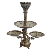 AN ART NOUVEAU STYLE BRONZE AND ENAMELLED CERAMIC EPERGNE TABLE CENTRE PIECE With single sconce