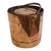 AN EARLY 19TH CENTURY COPPER GUN POWDER CONTAINER Having a single handle with central container