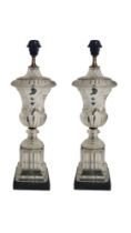 A PAIR OF CONTINENTAL GILT METAL BANDED GLASS TABLE LAMPS Classical urn form, standing on ribbed