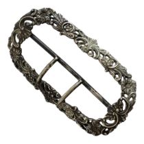AN 18TH CENTURY CONTINENTAL WHITE METAL BUCKLE Chased and engraved with openwork floral scroll