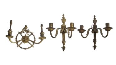 A PAIR OF LATE 19TH CENTURY LOUIS XVI STYLE GILDED BRASS TWO BRANCH WALL LIGHTS Flame finial top,