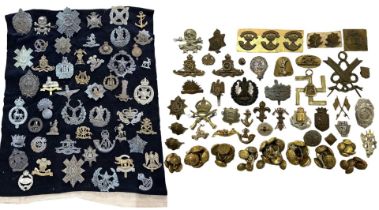 A LARGE ASSEMBLED COLLECTION OF WWI, WWII & LATER MILITARY REGIMENTAL CAP BADGES, BUTTONS AND OTHERS