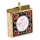 A MINIATURE GOLD AND ENAMEL QURAN CHARM, TESTED AS 18CT GOLD. (23mm x 16mm, 3.7g)