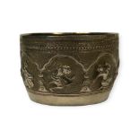 A LATE 19TH/EARLY 20TH CENTURY BURMESE SILVER BOWL Decorated with seven repoussé cartouches
