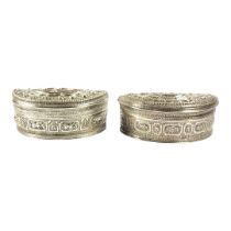 TWO LATE 19TH/EARLY 20TH CENTURY BURMESE SILVER LIME BOX OF DEMILUNE FORM First having alternating