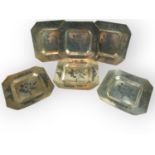 SIX MID 20TH CENTURY IRAQI/IRANIAN SILVER NIELLO SQUARE DISHES Centrally decorated with prominent
