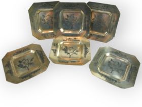 SIX MID 20TH CENTURY IRAQI/IRANIAN SILVER NIELLO SQUARE DISHES Centrally decorated with prominent