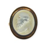 A 19TH CENTURY CARVED BANDED AGATE INTAGLIO RING DEPICTING SOCRATES, YELLOW METAL TESTED AS 14CT AND