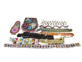 A COLLECTION OF 19TH AND 20TH CENTURY NATIVE AMERICAN BEADED ITEMS.