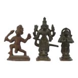A COLLECTION OF THREE 19TH CENTURY INDIAN COPPER ALLOY FIGURES Subramanya with peacock (Padmasana)