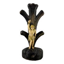 AN 18TH /19TH CENTURY CONTINENTAL BONE AND WOOD CARVING OF ST SEBASTIAN TIED AGAINST A TREE. (h 15.