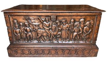 A RARE 15TH CENTURY FRENCH CARVED WALNUT COFFER, CIRCA 1450 With hinge lid above carved panel in