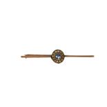 A VICTORIAN YELLOW METAL, BLUE TOPAZ AND SEED PEARL BAR BROOCH (YELLOW METAL TESTED AS 9CT ROSE