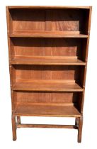 MANNER OF ERNEST GIMSON, AN EARLY 20TH CENTURY COTSWOLD SCHOOL WALNUT WATERFALL OPEN BOOKCASE. (h