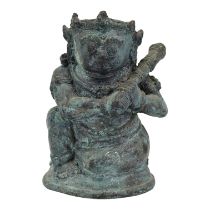 AN INDONESIAN, JAVANESE FIGURE OF BATHARA KALA/BHOMA Holding a gada (cudgel). (h 13.5cm x w 10.5cm x