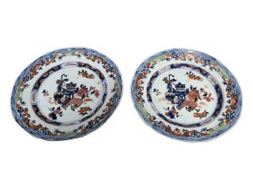 A PAIR OF 18TH CENTURY CHINESE EXPORT QIANLONG IMARI PORCELAIN PLATES Showing precious objects to