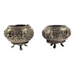 TWO LATE 19TH / EARLY 20TH CENTURY ANGLO-INDIAN SILVER SALTS Each having chased and repoussé