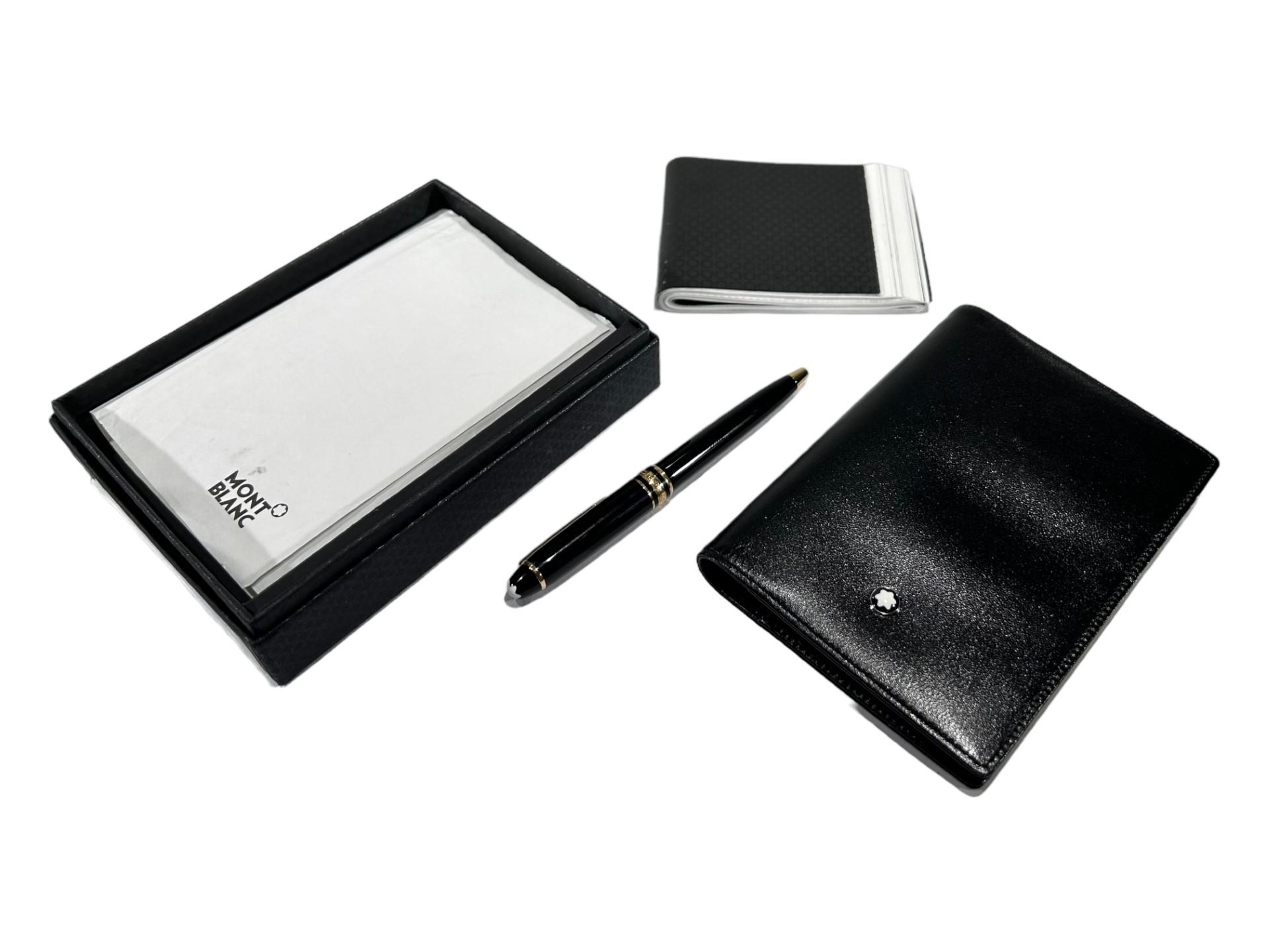 MONTBLANC, A BLACK LEATHER NOTEBOOK & BALLPOINT PEN, 14879, HOUSED IN ORIGINAL BOX.