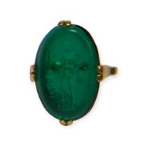 A 19TH CENTURY, POSSIBLY EARLIER CARVED GREEN GLASS INTAGLIO RING, MOUNTED IN 19TH CENTURY FRENCH