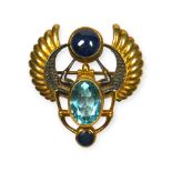 A VINTAGE SILVER GILDED EGYPTIAN REVIVAL STYLE, BLUE SPINEL AND TOPAZ WINGED SCARAB BEETLE BROOCH