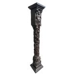 A RARE 16TH CENTURY CARVED OAK COLUMN Decorated with with a grotesque facial figure above