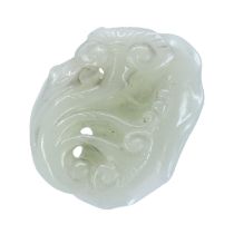 A CHINESE WHITE JADE CARVED LINGZHI FUNGUS PENDANT The pebble carved and pierced depicting three