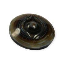 TIBETAN CARVED AGATE BUDDHIST HEAVEN EYE PENDANT. Provenance: private collection of a gentleman