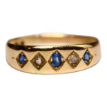 A VICTORIAN 15CT GOLD, DIAMOND & BLUE TOPAZ RING, three rough emerald cut topazes (largest approx.